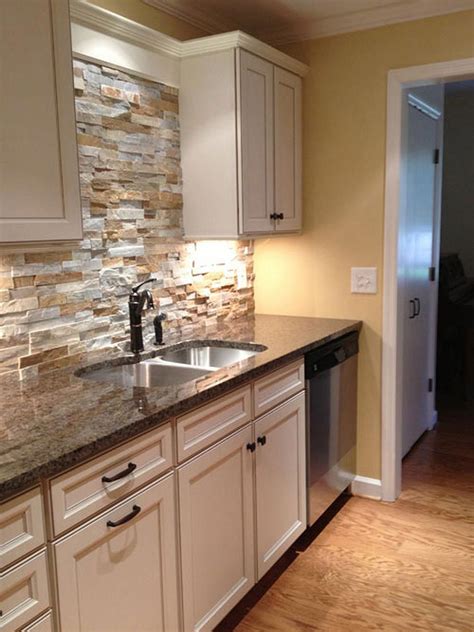 stacked stone backsplash white cabinet